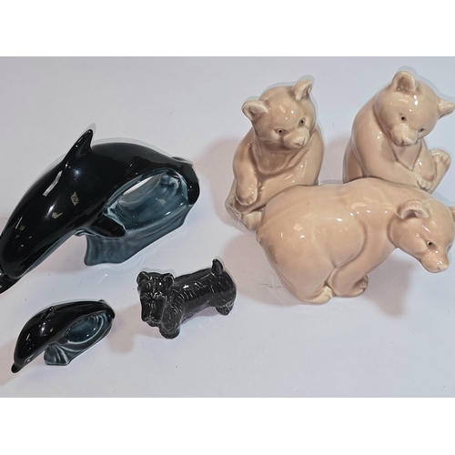 24 - Poole Pottery collection of animals to include three bears, penguin, miniature dolphin, blue Scottie... 