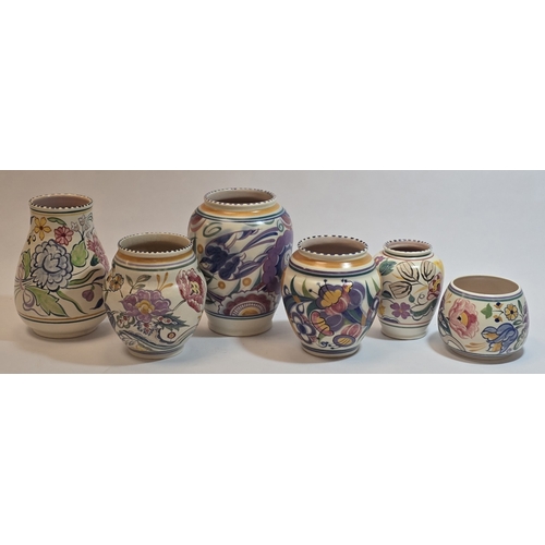 25 - Poole Pottery collection of Traditional pattern vases to include early bluebird example (6).