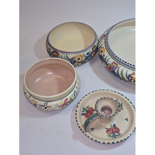 48 - Poole Pottery collection of traditional pattern shallow bowls and candle holders to include Carter S... 