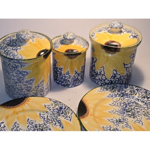 36 - Poole Pottery Vincent Sunflower collection of three lidded storage jars together with two 11