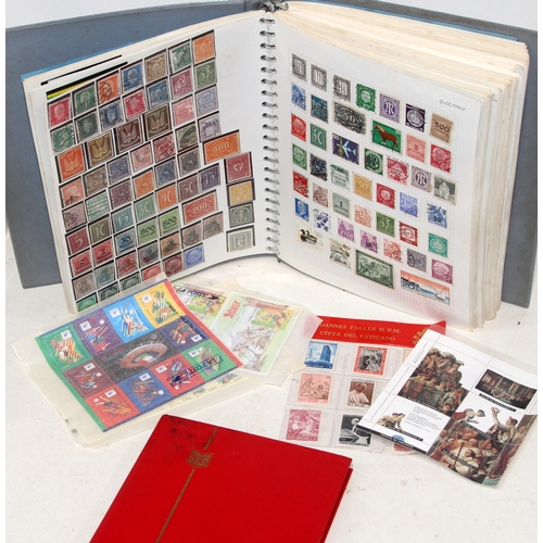 Large album of stamps. A small section of World stamps to the front ...