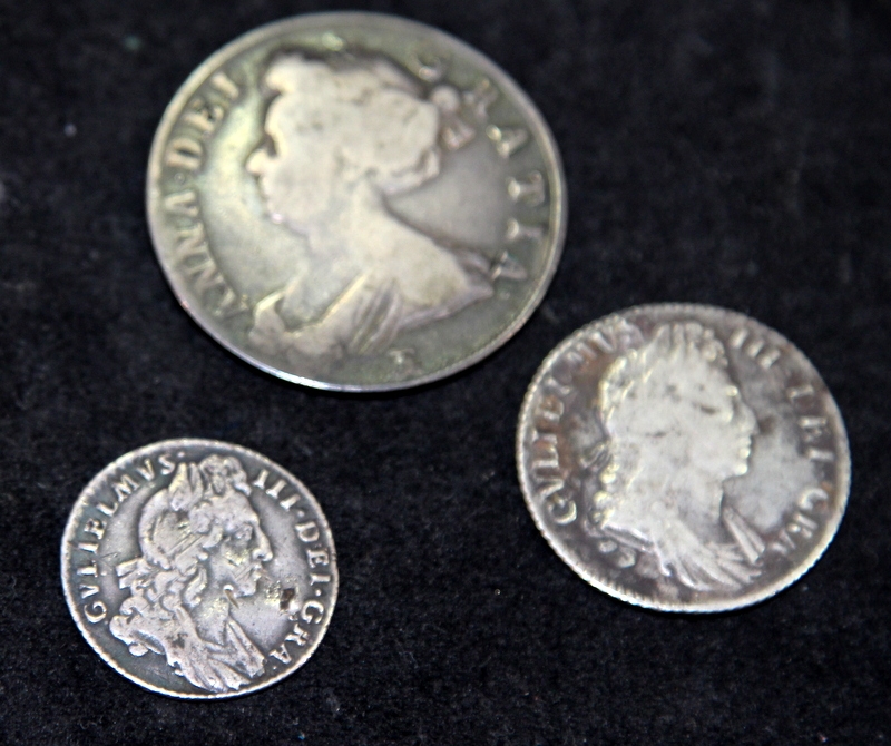 A small collection of silver coins to include 1697 William III Sixpence ...