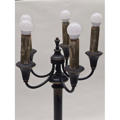 A vintage dark finished classical-style five arm candelabra table lamp ...