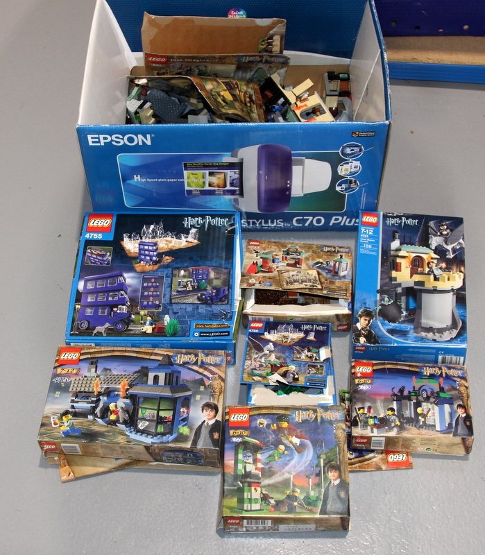 A quantity of Harry Potter related Lego. A number of boxes with some ...