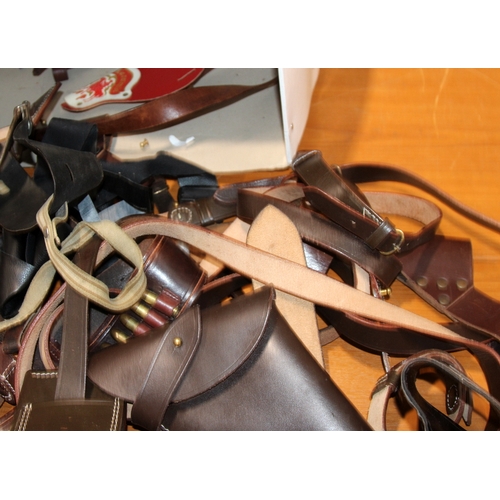 Theatre props: A collection of gun holsters and belts, all from theatre ...