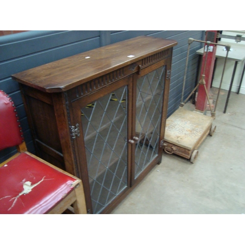 425 - OAK GLAZED BOOKCASES