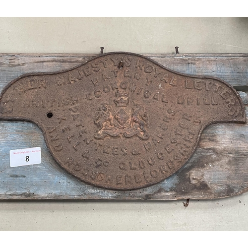 8 - CAST PLAQUE CONTAINING COAT OF ARMS