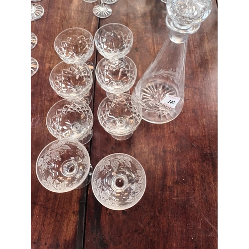 140 - EIGHT GLASSES AND DECANTER