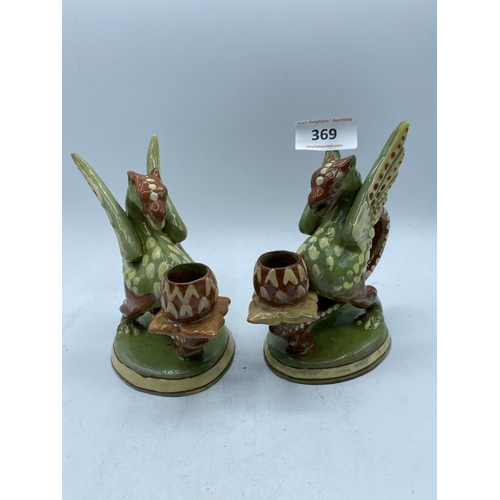 369 - 2 C H BARRUM 1875 GRIFFIN CANDLE HOLDERS