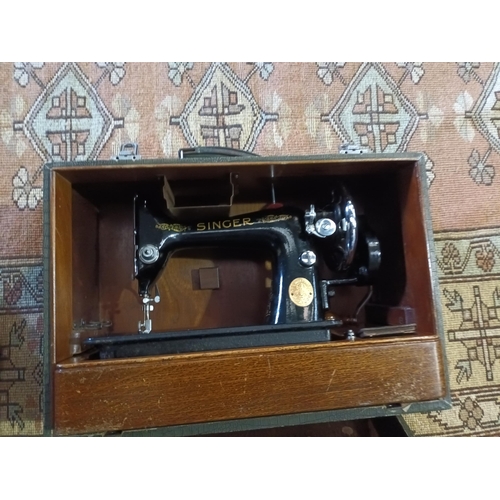 128 - SINGER SEWING MACHINE