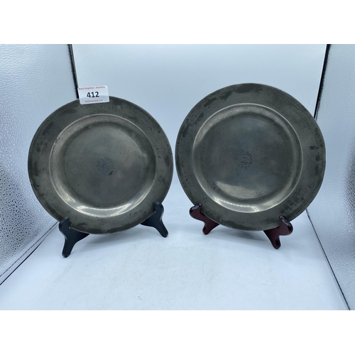 412 - 2 GRIFFIN PEWTER PLATES