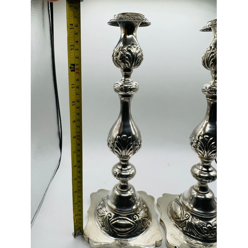 501 - PAIR OF SOLID SILVER CANDLESTICKS LONDON 1912. MAKERS R&T WASHBOURNE LTD. 1264G