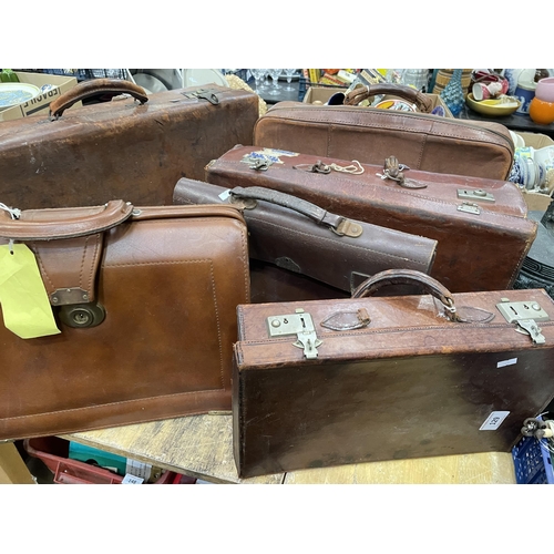 129 - 6 LEATHER SUITCASES