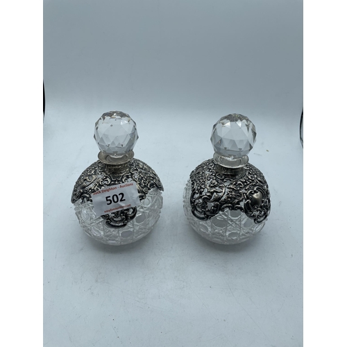 502 - SILVER PERFUME BOTTLES HALLMARKED