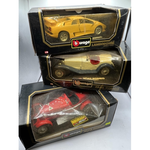 472 - 3 BOXED URAGO CARS