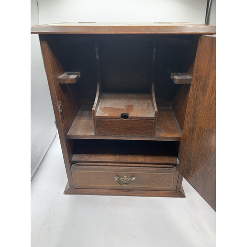 6 - TOBACCO CABINET