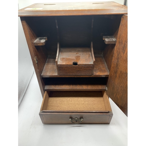 6 - TOBACCO CABINET