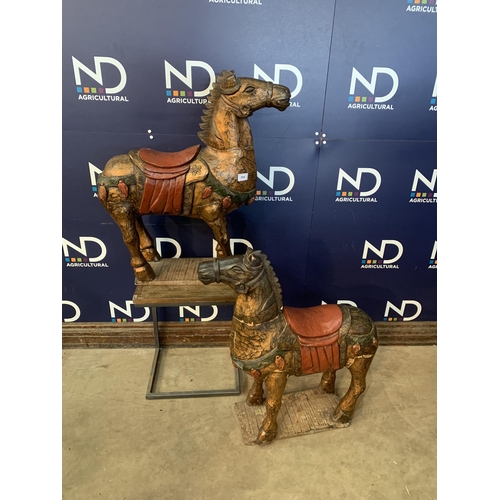 294 - PAIR OF CARVED WOODEN HORSES