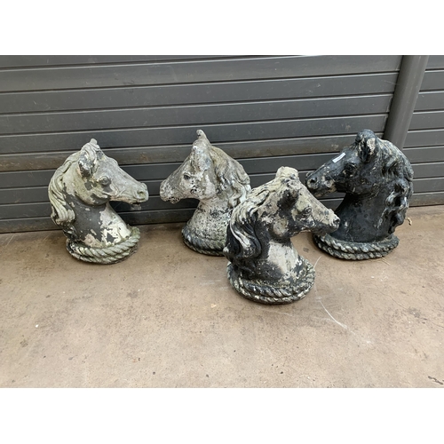 546 - COMPOSITE STONE HORSE HEADS