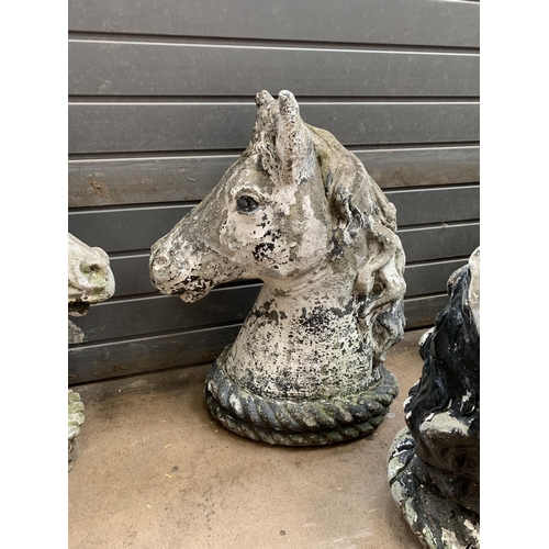 546 - COMPOSITE STONE HORSE HEADS