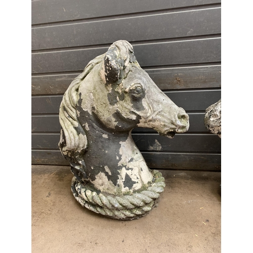 546 - COMPOSITE STONE HORSE HEADS