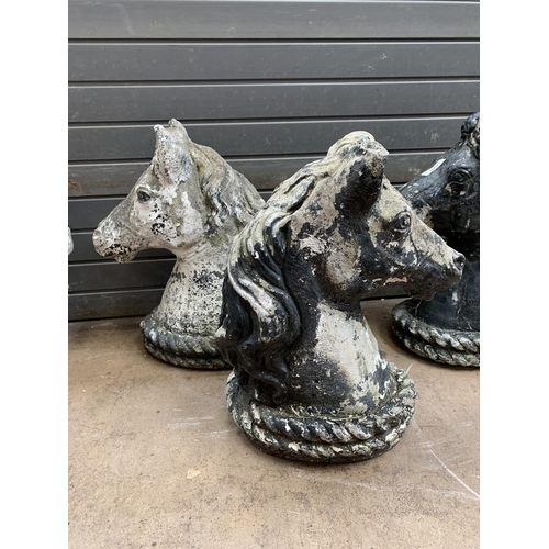 546 - COMPOSITE STONE HORSE HEADS