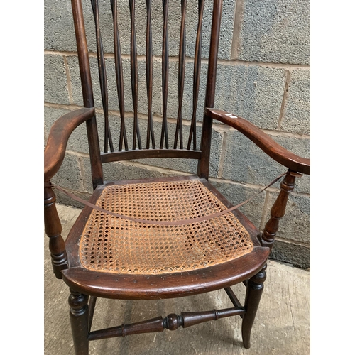 248 - UNUSUAL RATTAN CHAIR