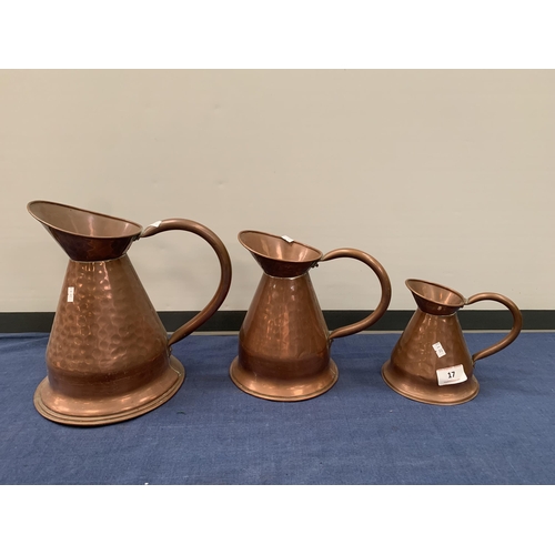 17 - COPPER JUGS