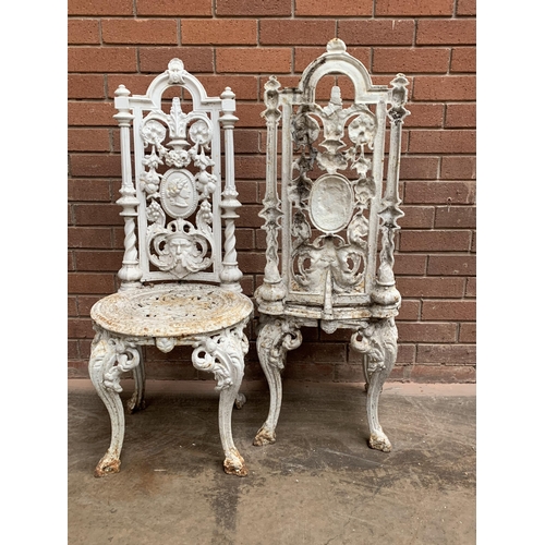 243 - IN THE MANNER OF COALBROOKDALE PAIR OF CAST GARDEN CHAIRS