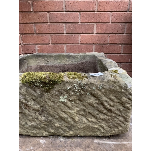 155 - CARVED RED SANDSTONE TROUGH APPROX 60CM X 51CM