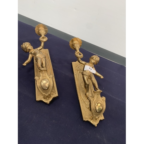 77 - BRASS CHERUB CANDELABRAS