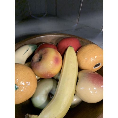 245 - CERAMIC FRUIT IN A TREEN BOWL