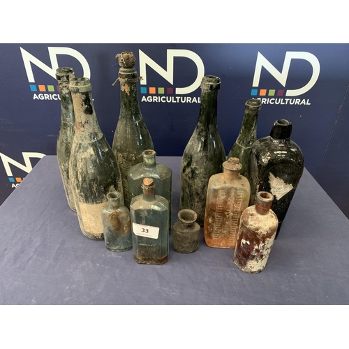 33 - DECORATIVE GLASS BOTTLES