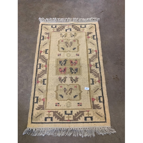 66 - RUG APPROX 75CM x 135CM