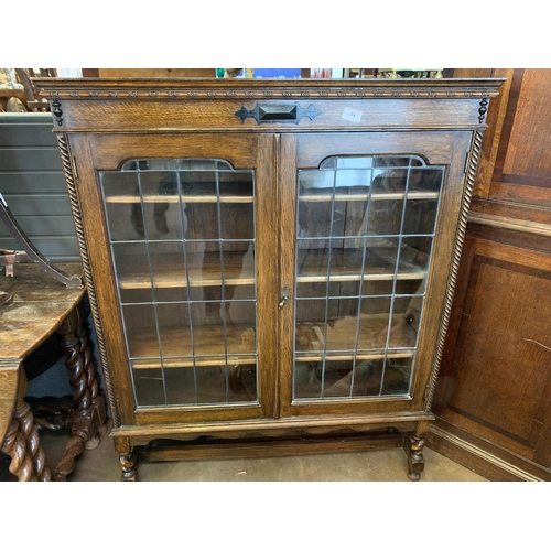 74 - GLASS FRONTED LEADED CABINET