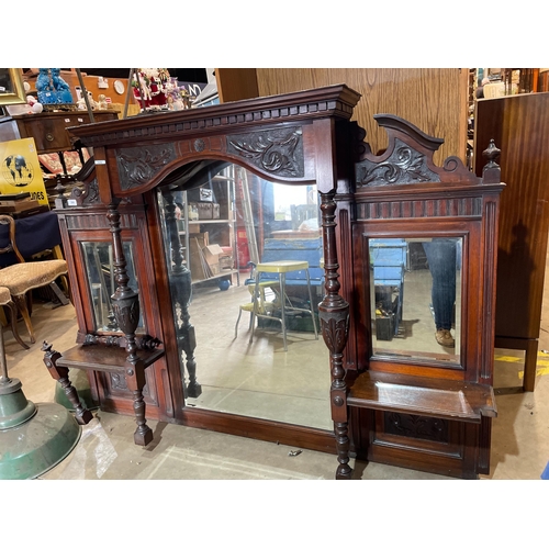 384 - LARGE OVERMANTLE MIRROR HEAVILY CARVED