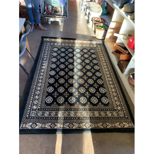 16 - LARGE RUG 1.6M X 2.3M