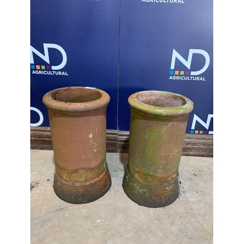 102 - PAIR OF TERRACOTA CHIMNEY POTS