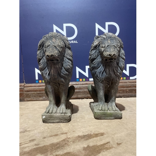 40 - A PAIR OF COMPOSITE GARDEN LIONS