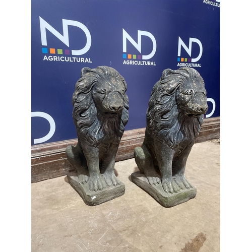 40 - A PAIR OF COMPOSITE GARDEN LIONS