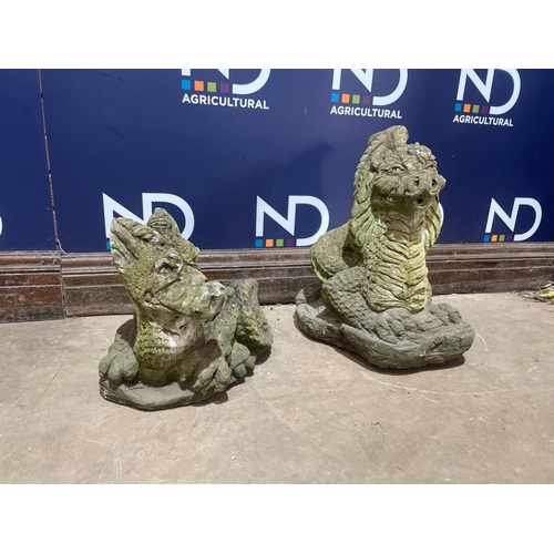 42 - A PAIR OF COMPOSITE STONE DRAGONS