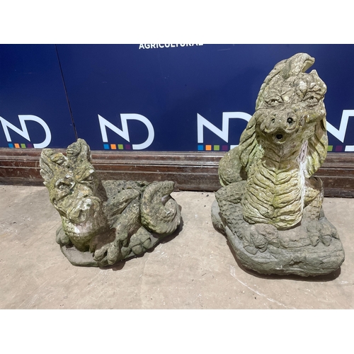 42 - A PAIR OF COMPOSITE STONE DRAGONS