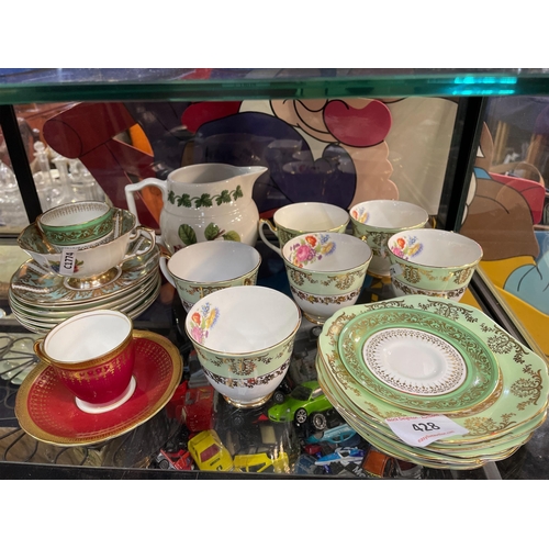 428 - PORCELAIN CUPS & SAUCERS