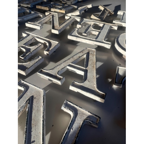 10 - HEAVILY WEATHERED CAST LETTERS