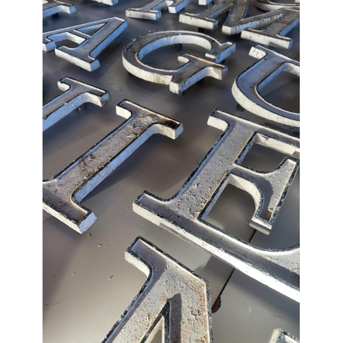 10 - HEAVILY WEATHERED CAST LETTERS