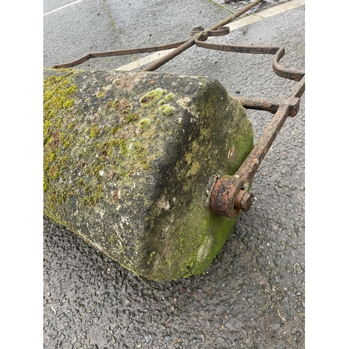 57 - LARGE CARVED STONE ROLLER