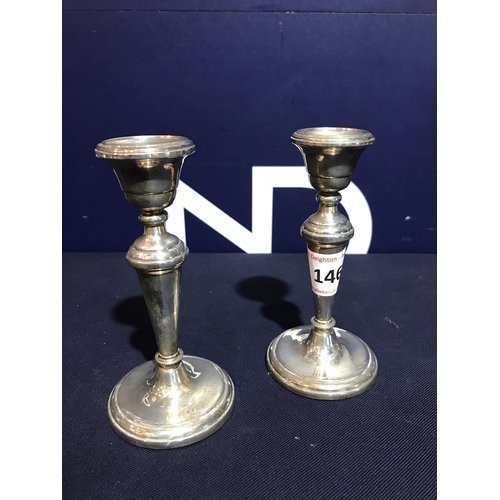 146 - HALLMARKED SILVER CANDLESTICKS W I BROADWAY & CO 1986 BIRMINGHAM COMBINDED WEIGHT 215GMS