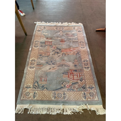 174 - RUG APPROX 2.1M X 1.2M