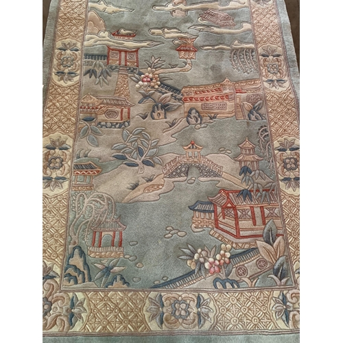 174 - RUG APPROX 2.1M X 1.2M