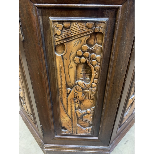 200 - HEAVILY CARVED ORIENTAL  DRINKS CABINET